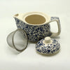 Small herbal teapot with blue pattern ceramic body and removable metal strainer for brewing herbal tea cups