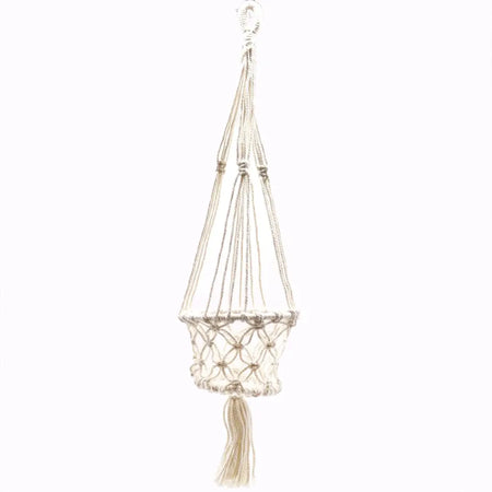 Small cream-colored macrame pot holder with a woven net pattern and tassel detail for a single plant pot