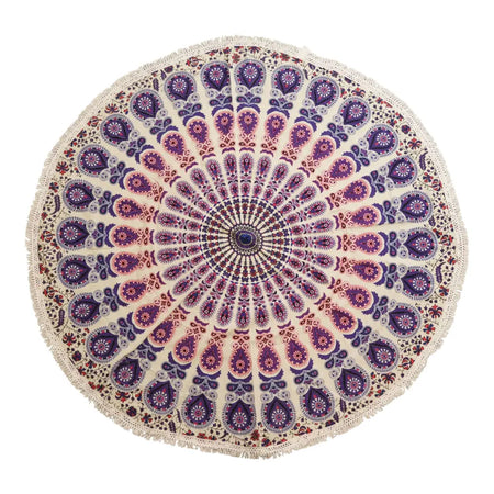 A cream cotton mandala beach towel with purple and pink paisley patterns and a dark blue center dot peacock purples design