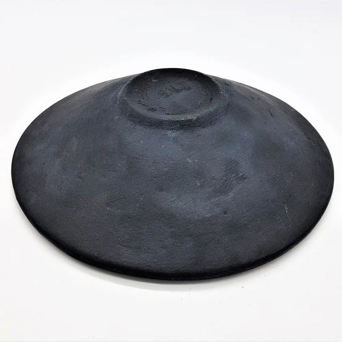 Small mosaic tile dish blue matte black handcrafted clay bowl with textured surface and center indentation