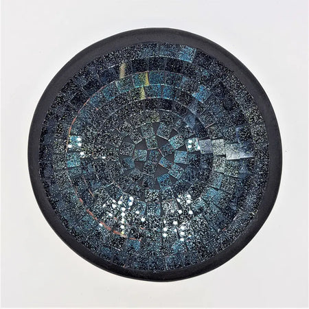 Small mosaic tile dish with circular dark blue and black glass mosaic rings in a matte black frame