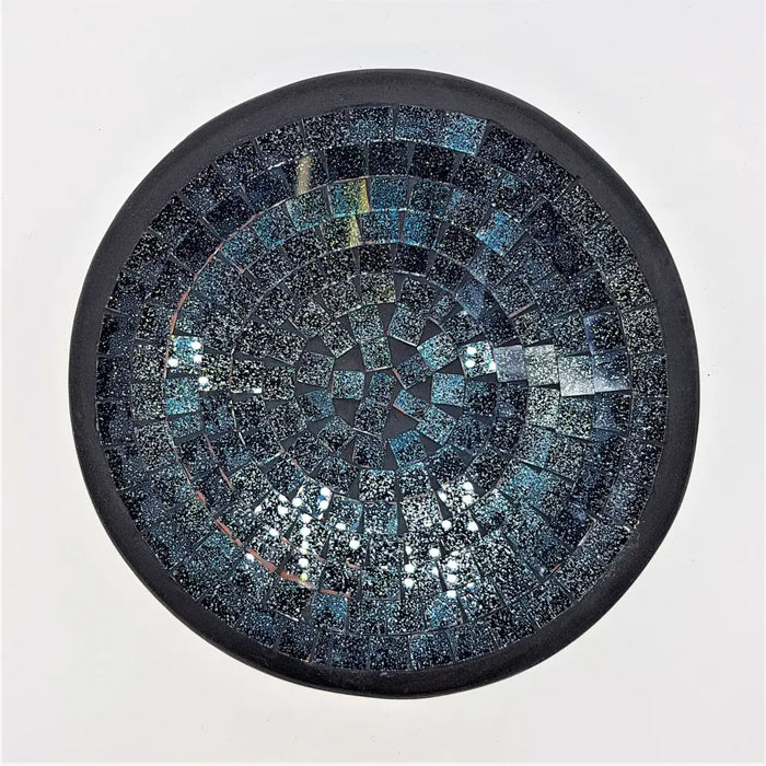 Small mosaic tile dish with circular dark blue and black glass mosaic rings in a matte black frame