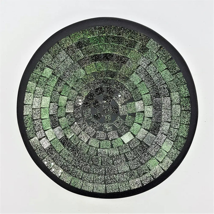 Small mosaic tile dish with circular green silver and black textured tiles in a sleek black frame