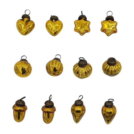 Small amber mouth-blown glass baubles shaped like hearts stars pumpkins acorns and teardrops with metallic caps