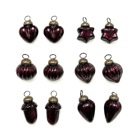 Set of twelve maroon mouth-blown glass baubles with brass caps and loops for holiday decoration