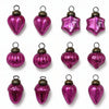 Set of twelve classic pink mouth-blown glass baubles with varied shapes and gold caps for christmas decoration
