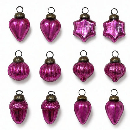 Set of twelve classic pink mouth-blown glass baubles with varied shapes and gold caps for christmas decoration