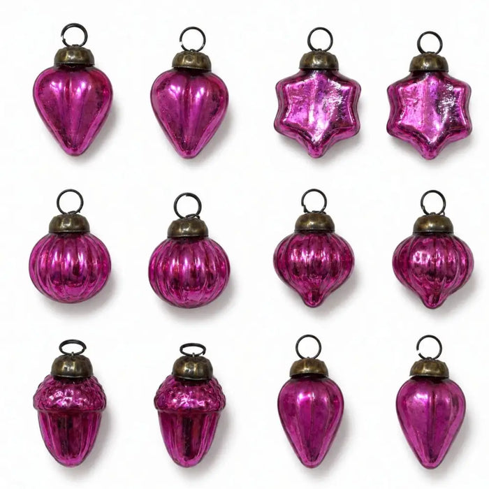 Set of twelve classic pink mouth-blown glass baubles with varied shapes and gold caps for christmas decoration