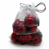 Small red glossy mouth-blown glass baubles with dark caps inside a sheer white organza bag