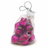 A clear plastic bag of 12 vibrant fuschia mouth-blown glass baubles with gold caps for hanging