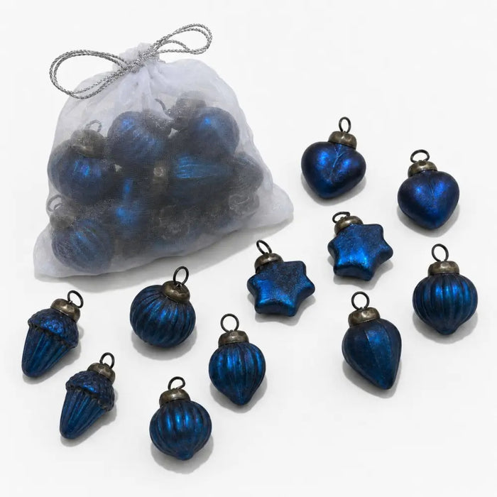 Set of turquoise mouth-blown glass baubles in heart star and acorn shapes made from blue metallic glass