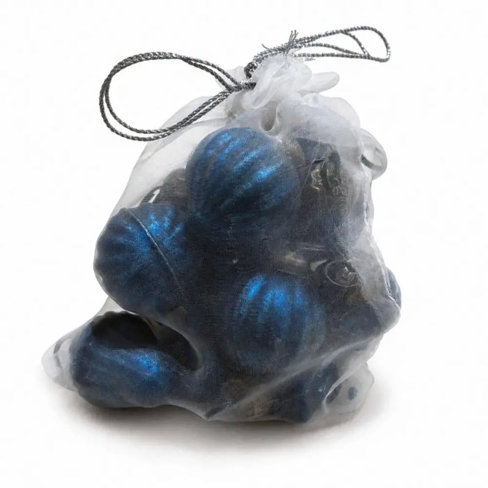 A clear organza bag of 12 turquoise mouth-blown glass baubles tied with a silver drawstring