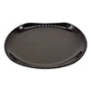 Small oval black ceramic plate with a glossy finish smooth rounded edges and a subtle embossed logo