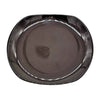 Small oval ceramic plate in shiny black with rounded edges and a glossy finish for serving or dining use