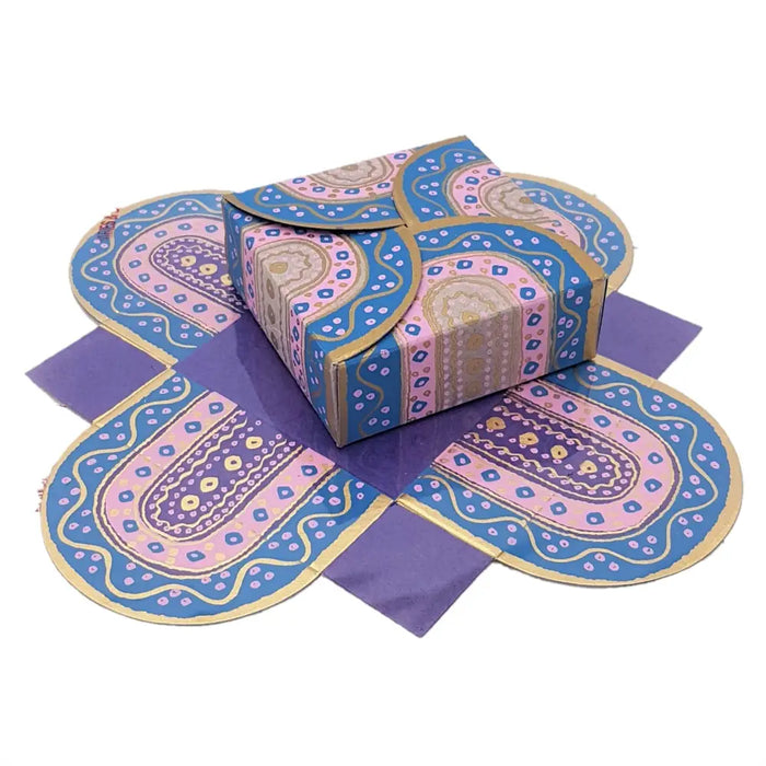 Small printed card gift box with blue pink paisley pattern and gold trim made from decorative paper