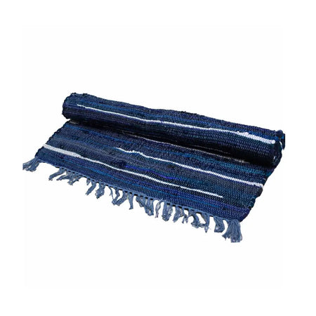A rolled small rag rug in dark blue with white stripes made of woven fabric and frayed edges