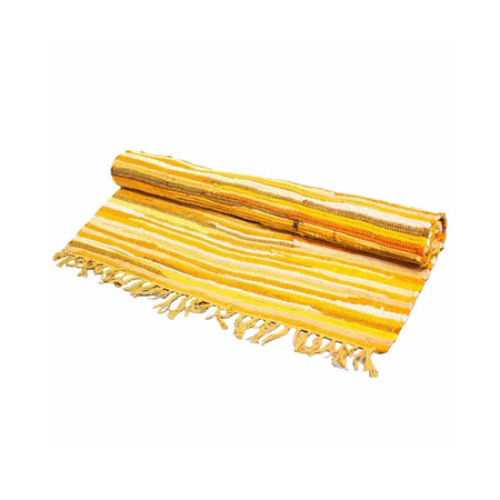 A rolled yellow and orange striped woven rag rug with fringed edges in sunrise oranges colors