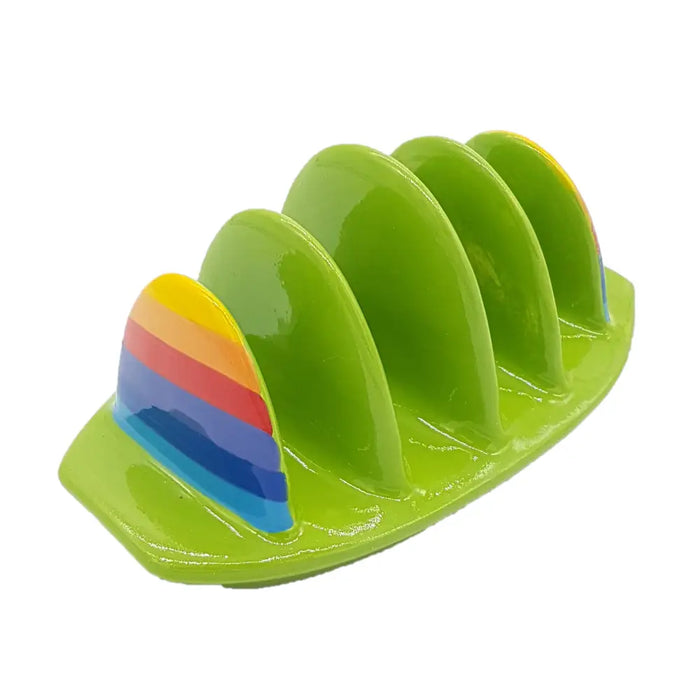Small rainbow ceramic toast rack in vibrant lime green ceramic with a rainbow-striped surfboard design on one side