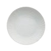 Small white porcelain plate with a subtle swirling textured pattern made of white porcelain ceramic