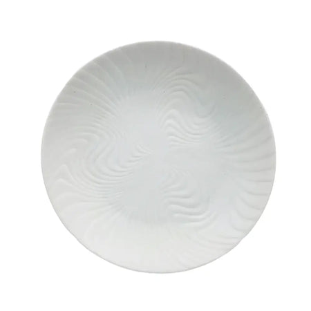 Small white porcelain plate with a subtle swirling textured pattern made of white porcelain ceramic