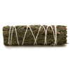 A small smudge stick of dried cedar tied with white twine measuring 11cm for cleansing or smudging rituals