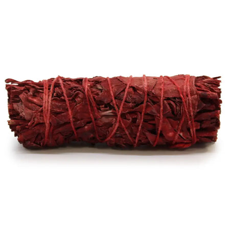 A smudge stick of dried red dragons blood sage leaves tied with reddish-brown twine measuring 10cm