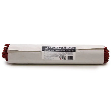 A roll of dragons blood sage smudge sticks with deep red tips wrapped in white paper with a black label