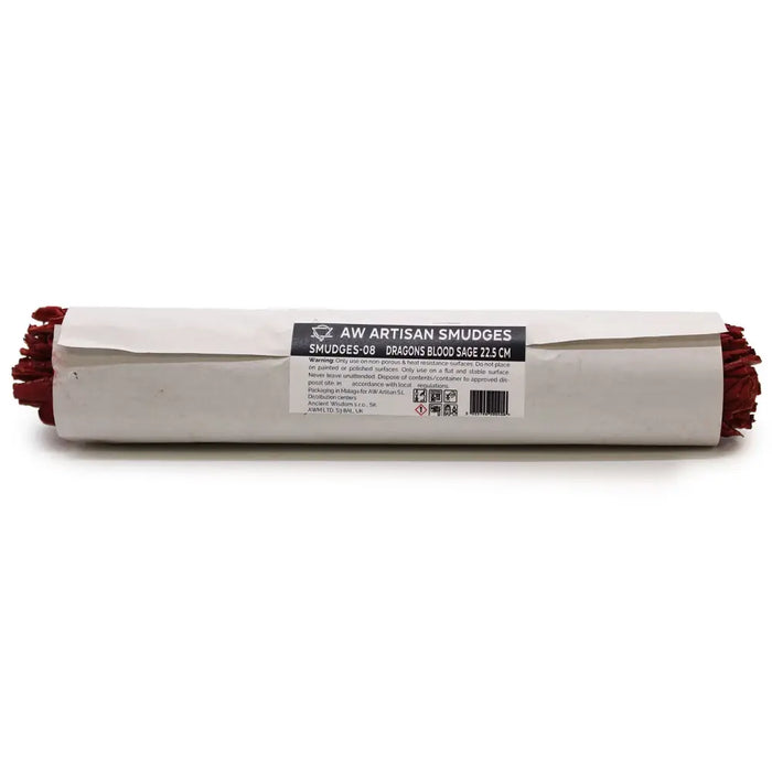 A roll of dragons blood sage smudge sticks with deep red tips wrapped in white paper with a black label