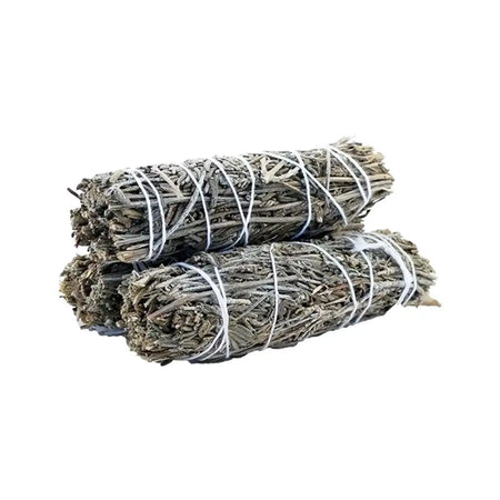 Two bundles of dried lavender sage smudge stick tied with white string for cleansing and ritual use