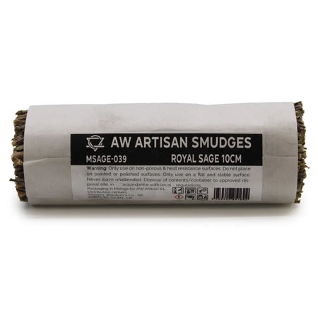 A cylindrical roll of dried royal sage smudges wrapped in white paper with a black aw artisan smudges label 10cm