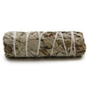 A tightly bound smudge stick of dried white sage leaves secured with white twine measuring 10cm long