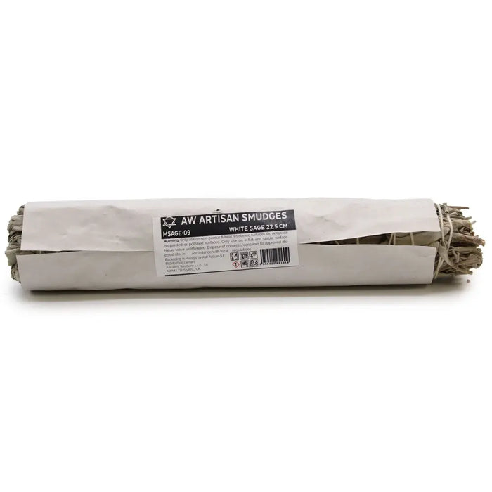 A bundled white sage smudge stick about 22.5cm long wrapped in a simple paper sleeve with product labeling