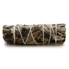 A smudge stick made of tightly bound dried white sage and black sage leaves tied with white twine