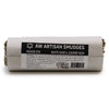 A cylindrical smudge stick of white sage and juniper wrapped in white paper with black labeling measuring 10cm