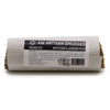 A roll of white sage and lavender smudge sticks wrapped in a cylindrical paper package with black labels