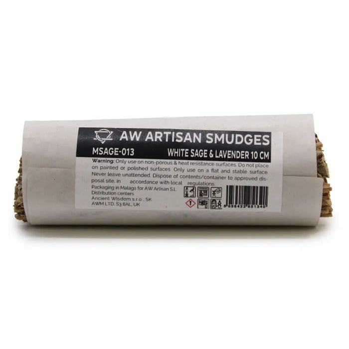A roll of white sage and lavender smudge sticks wrapped in a cylindrical paper package with black labels
