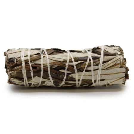 A tightly bound 10cm smudge stick of dried white yerba santa sage wrapped with thin white twine