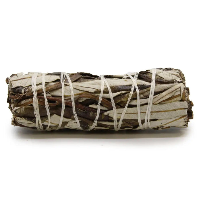 A tightly bound 10cm smudge stick of dried white yerba santa sage wrapped with thin white twine