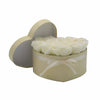 Cream-colored heart-shaped soap flowers box with matching ribbon filled with white artificial roses