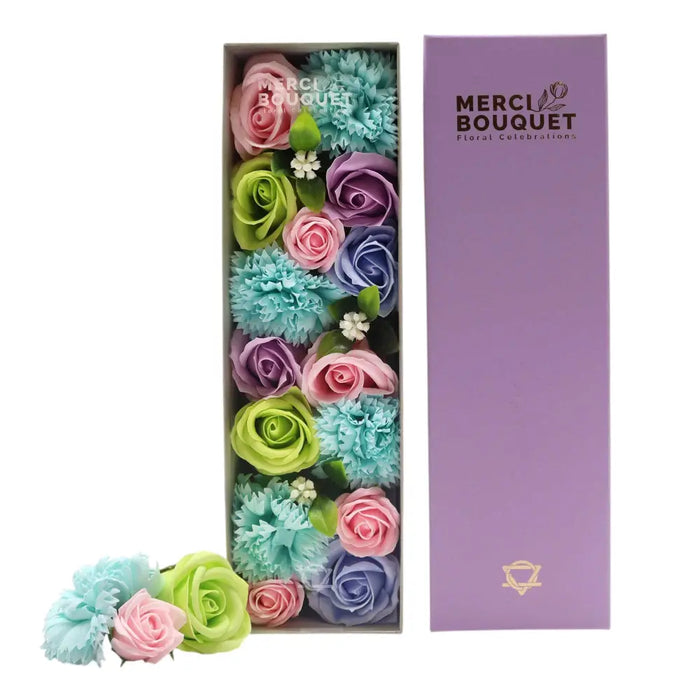 A soap flower gift box with pastel pink blue green and purple artificial soap flowers in a lavender box