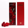 Red roses soap flower gift arranged in a bouquet inside a clear box with matching red flower gift box packaging