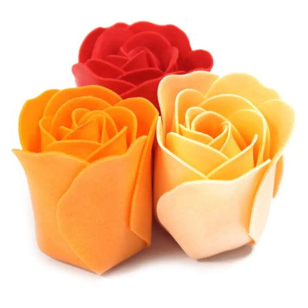Three colorful foam bath soap roses in red orange and peach hues for a decorative and fragrant bath set