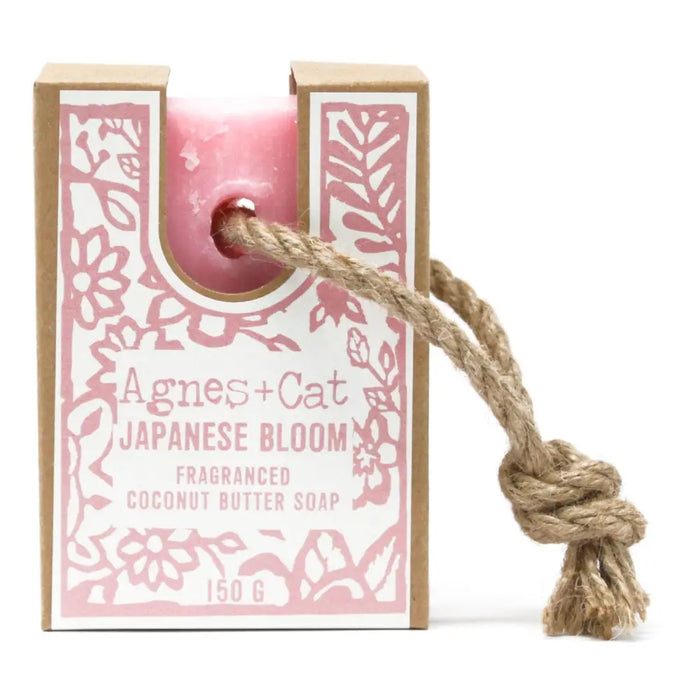 Pink japanese bloom fragranced coconut butter soap on a rope in a decorative cardboard box with a hanging loop