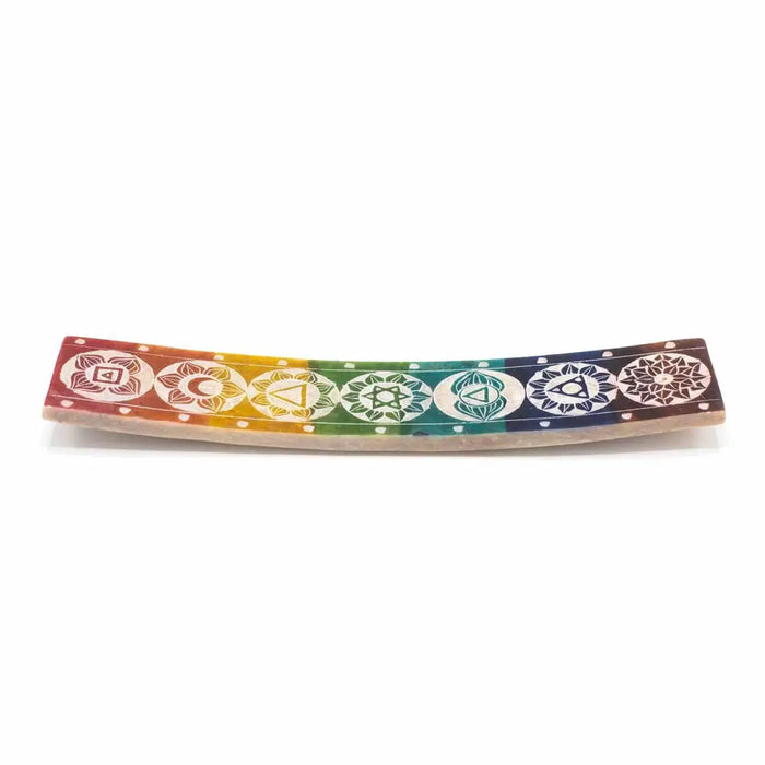 Soapstone incense holder with rainbow colors and seven white chakra symbols engraved for soapstone incense use