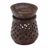 Soapstone oil burner in brown marble with a bowl top and heart-shaped cutouts on the base