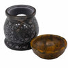 Black soapstone oil burner with lotus mandala carving and yellow amber bowl for aromatherapy oil use
