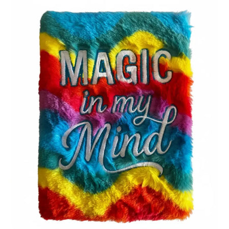 A rainbow-colored fluffy soft book dream journal with magic embroidered in silver thread on the cover