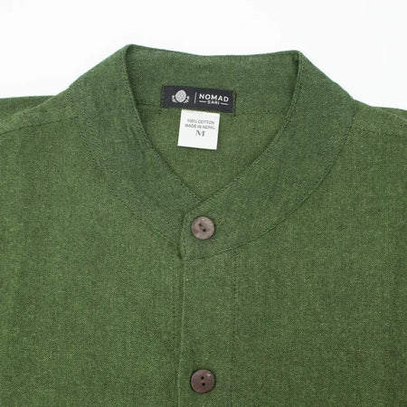 Olive green breathable cotton kathmandu shirt with wooden buttons and nomad sari brand label in medium size