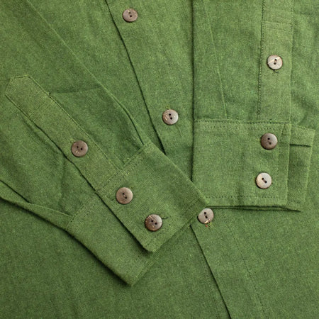 Green linen soft cotton kathmandu shirt with natural wooden buttons in forest green breathable cotton fabric