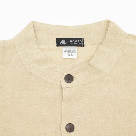 Beige breathable cotton kathmandu shirt with dark brown buttons and nomad sari label for everyday wear in xl stone color
